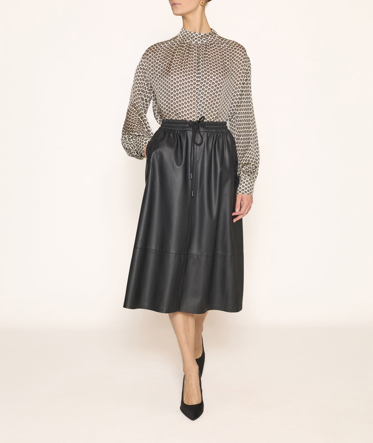 Milla | Black faux leather elastic waist midi skirt