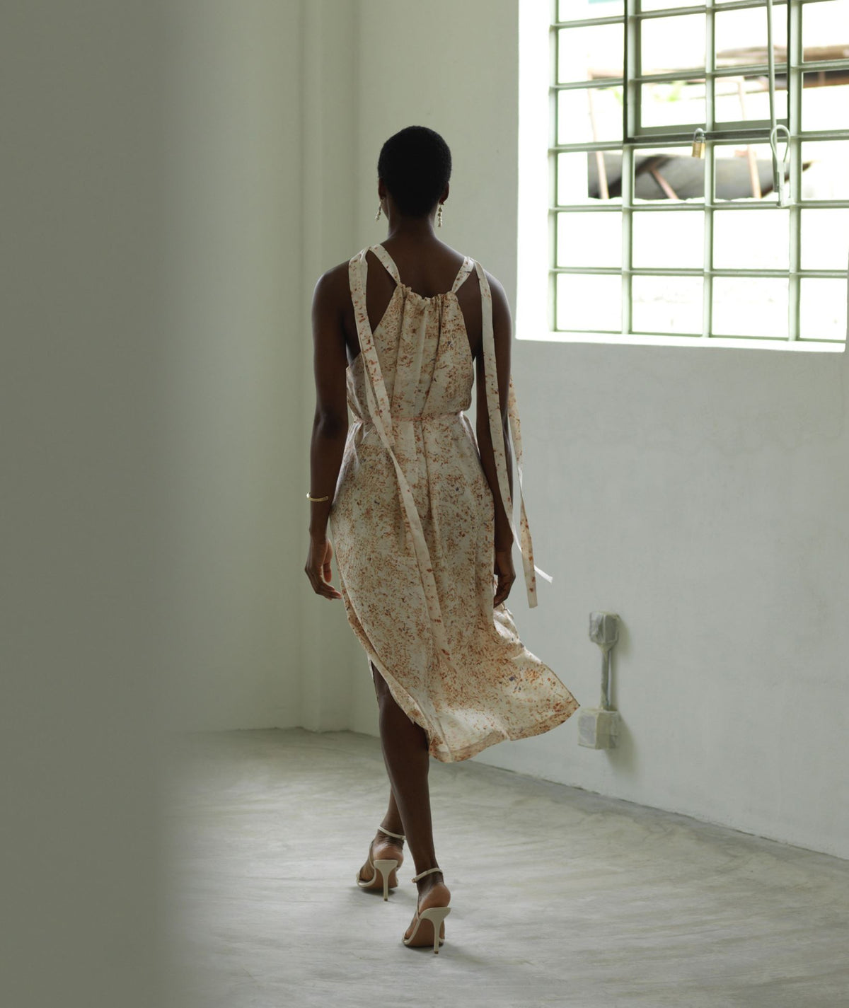 Angelos Tsakiris | Ivory eco- printed flowers silk halter midi dress