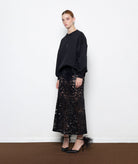 Mallory The Label | Black lace sequined Nora midi skirt