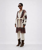 Mallory The Label | Ecru jacquard knitted fringed Biarritz belted cardigan
